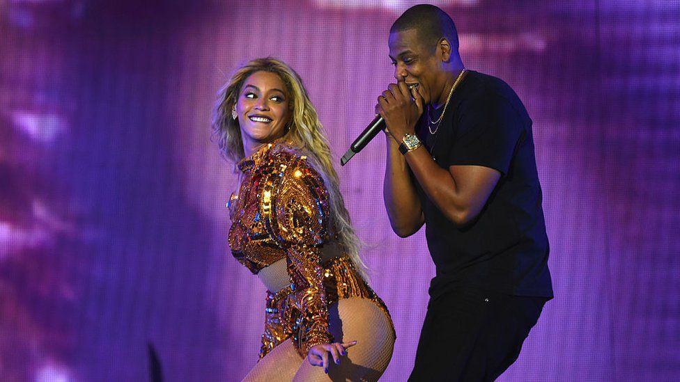 Beyonce and Jay Z performing on stage