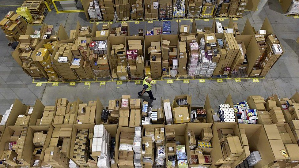 Amazon packages at a fulfilment centre