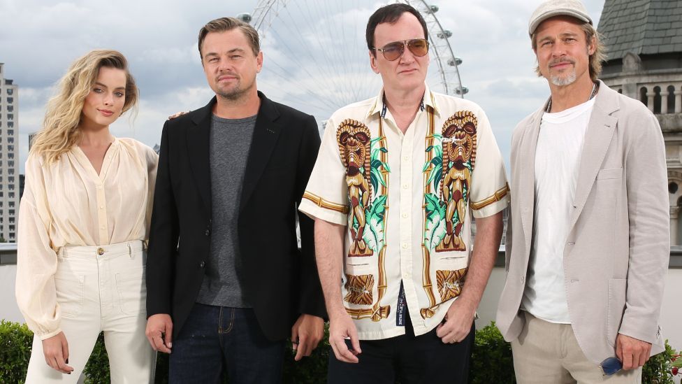 Margot Robbie, Leonardo DiCaprio, Quentin Tarantino and Brad Pitt attending a photocall for Once Upon A Time... In Hollywood, held at the Corinthia Hotel, London.