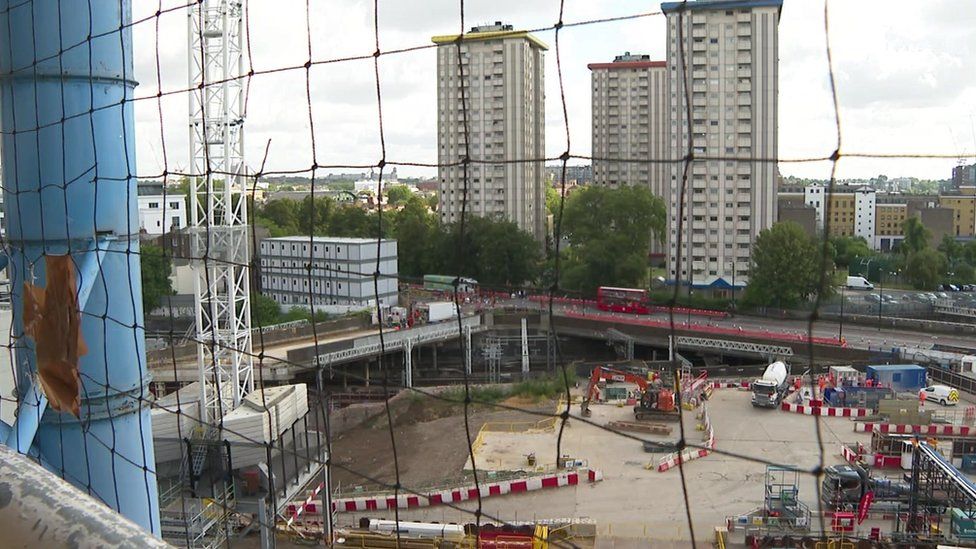 A view from a balcony in a tower block overlooking the HS2 construction site.
