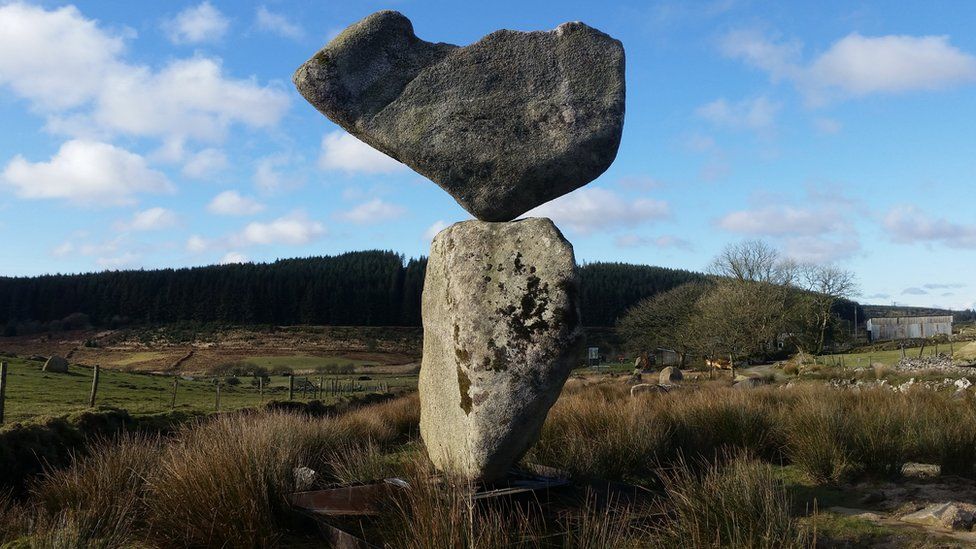 A photo of a stone balance