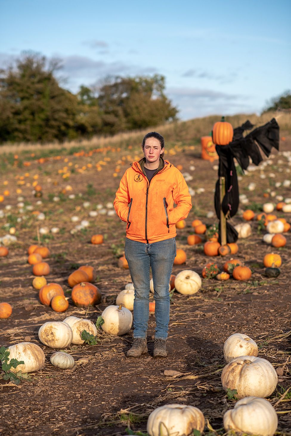 Annabel stands in a pumpkin patch in St Abbs village in the Scottish Borders