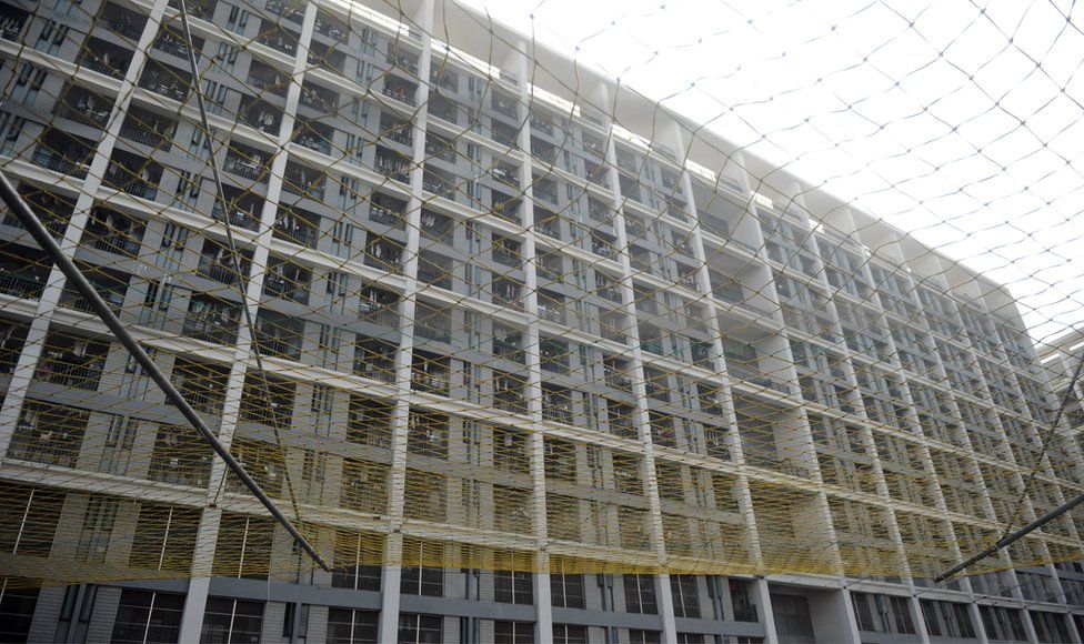 A protective net added to a Foxconn employee dormitory in Shenzhen, China