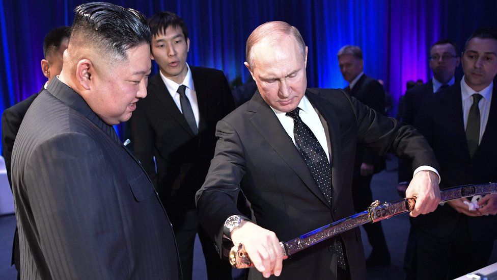 Putin shows Kim a sword