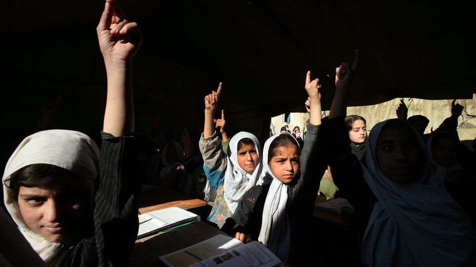 Afghan girls in school prior to the Taliban take over