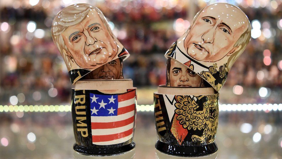 This picture taken on July 6, 2017, shows traditional Russian wooden nesting dolls, called Matryoshka dolls, depicting US President Donald Trump (L) and Russia"s President Vladimir Putin (R) at a gift shop in central Moscow. US president Donald Trump is due to meet his Russian counterpart Vladimir Putin on July 7, 2017 during G20 summit in Germany.