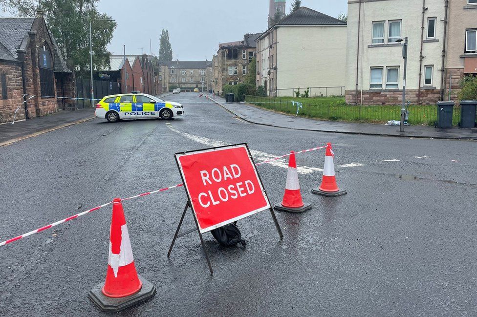 Road closures are in place at the scene in Paisley as investigations continue at the scene