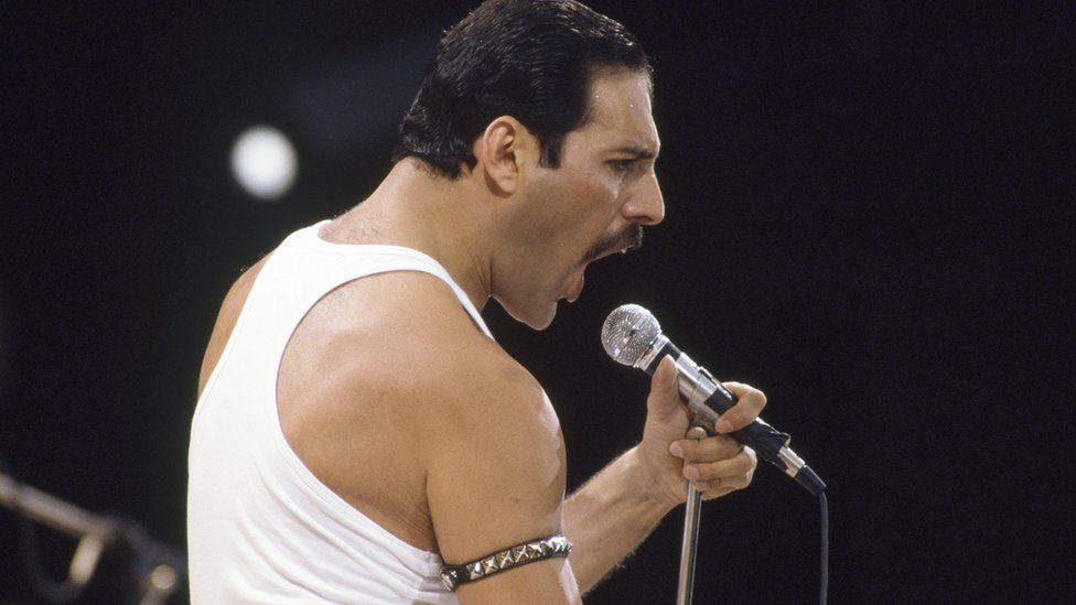Freddie Mercury on stage at Live Aid in 1985