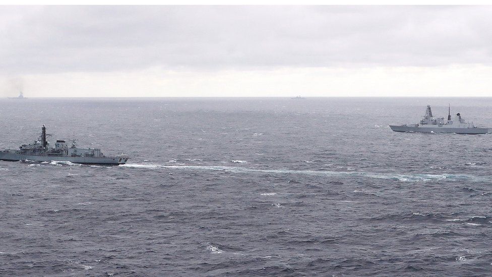 HMS Duncan (right) tracking a warship in the Russian taskforce