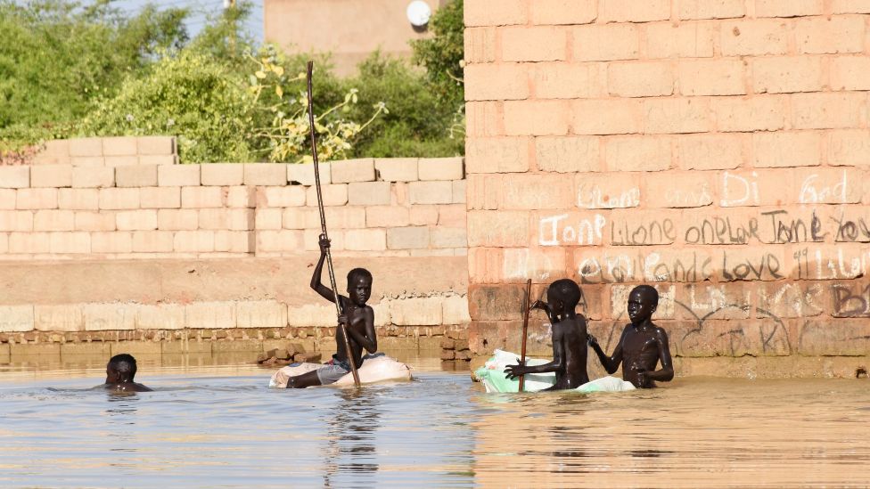 Children playing in flood water in Omdurman, Sudan - 2020