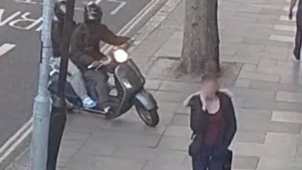 CCTV of moped riders following a victim carrying a mobile phone