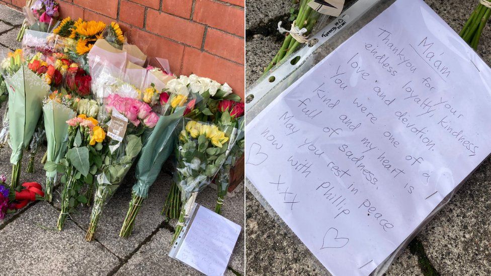 Floral tributes accompanied by messages
