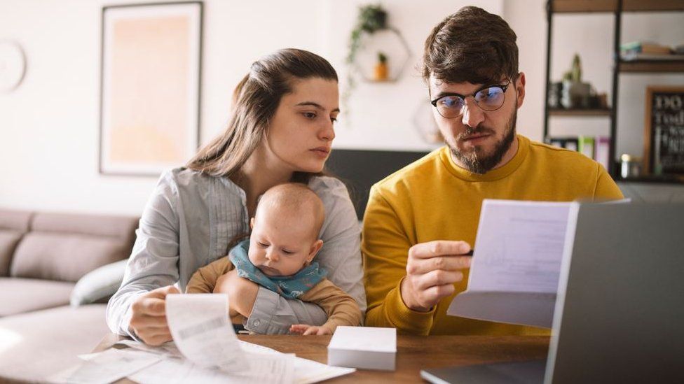 Couple looking at bills