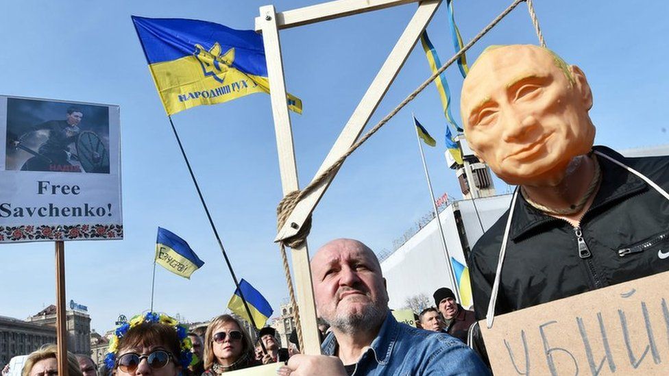Protesters with an effigy of Vladimir Putin in Kiev, Ukraine