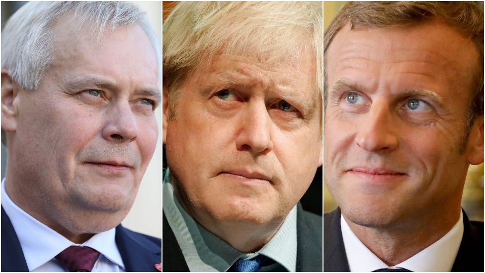 Finnish PM Antti Rinne (left) says he and French President Emmanuel Macron (right) agreed the new deadline for Boris Johnson (centre)