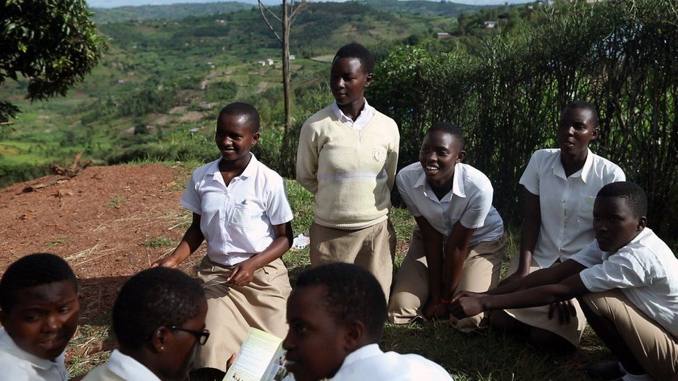 Students gather outside the Safe School for Girls to discuss issues facing girls and women in Rwanda