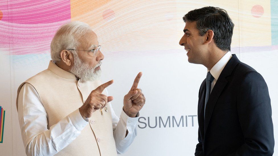 India's Prime Minister Narendra Modi and Rishi Sunak