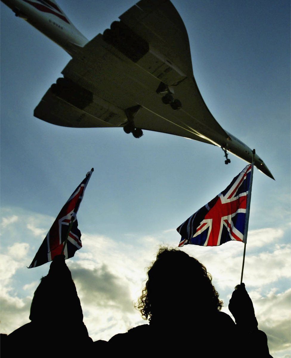 Flag-wavers looking at Concorde