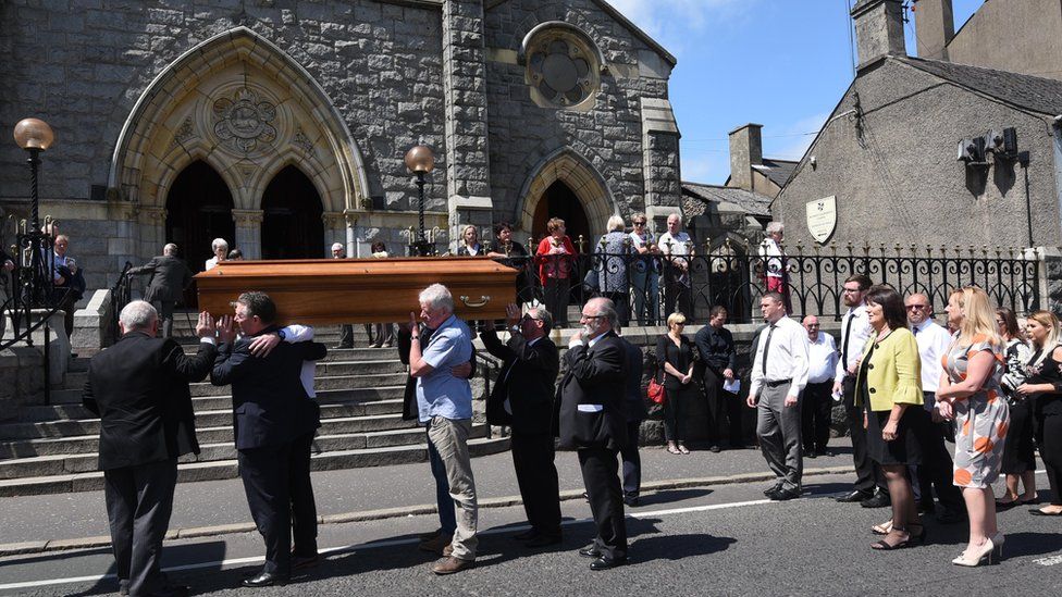 Seamus Ruddy's coffin carried into the Chapel