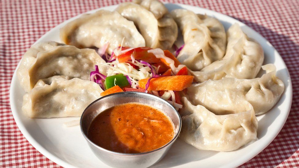 India lawmaker wages war on street food momos - BBC News