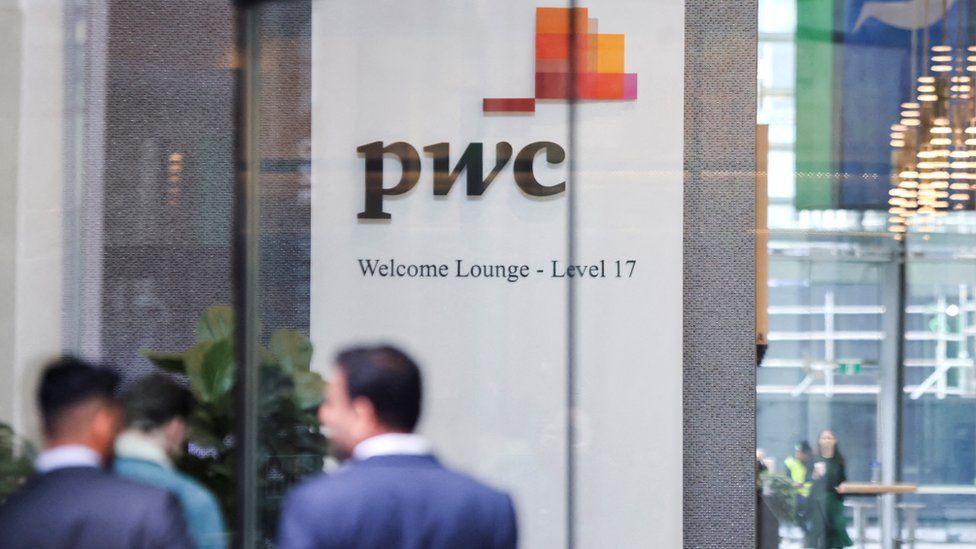 The PwC logo seen in the lobby of their offices in Barangaroo, Australia.