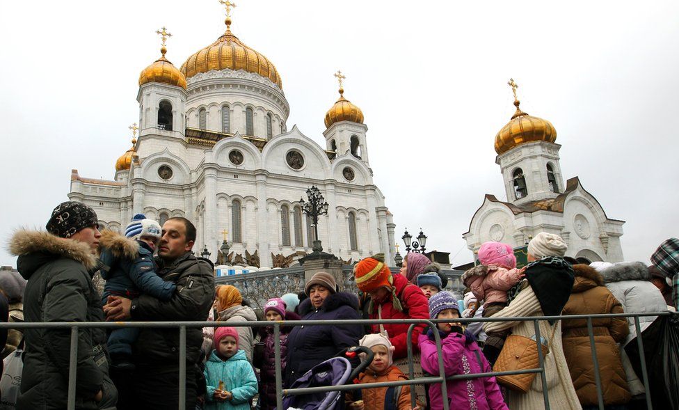 The faithful stand in a line to enter the Moscow Christ the Saviour Cathedral in 2011, to see an Orthodox relic, the Belt of the Virgin Mary from Mount Athos.