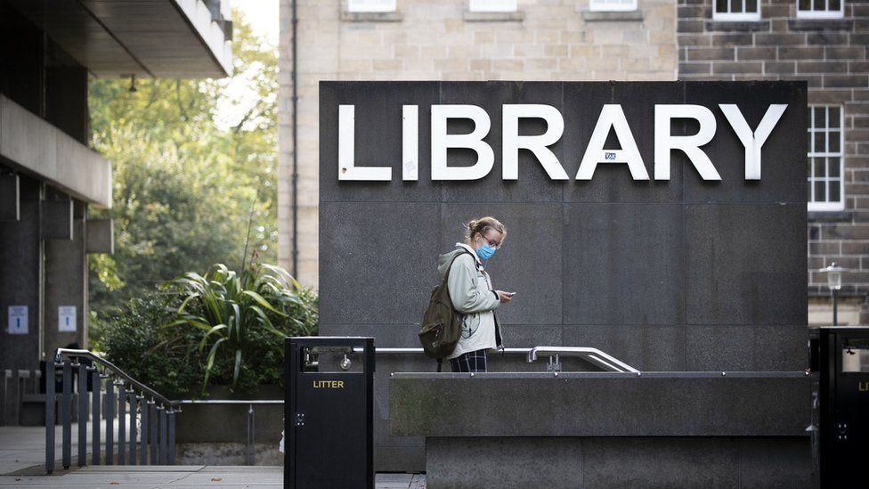 Student at university library