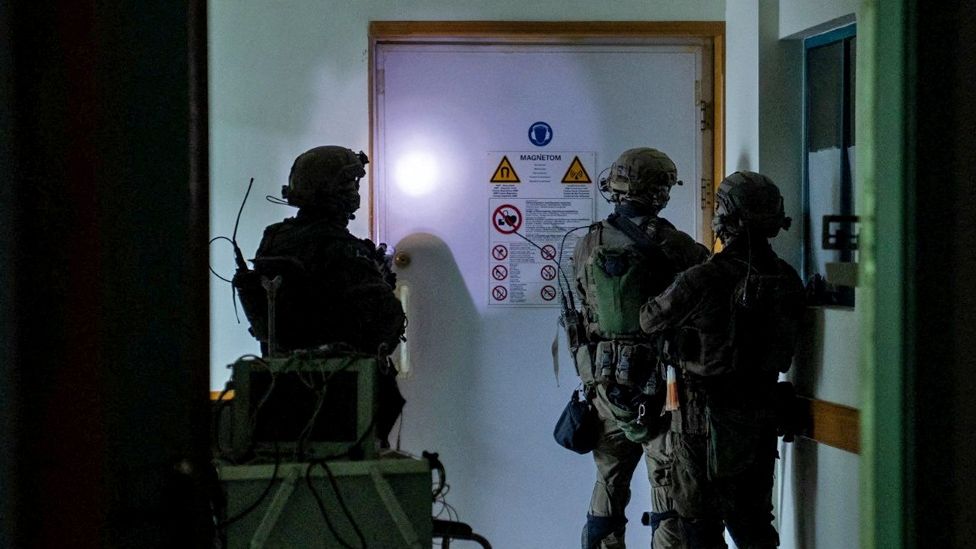 Israeli soldiers shown inside the Al-Shifa Hospital complex in an Israeli Defense Forces handout image from 15 November 2023