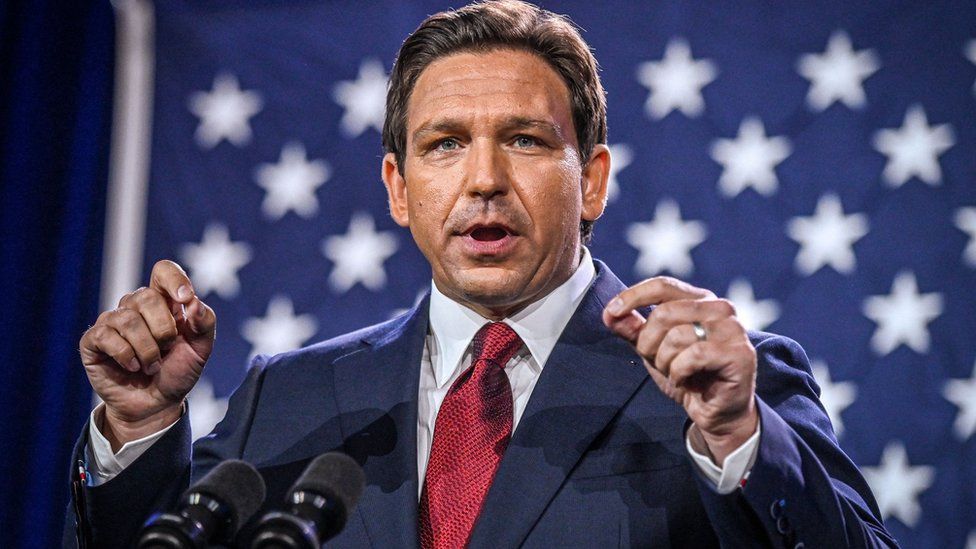 DeSantis speaks to a crowd gathered in Florida