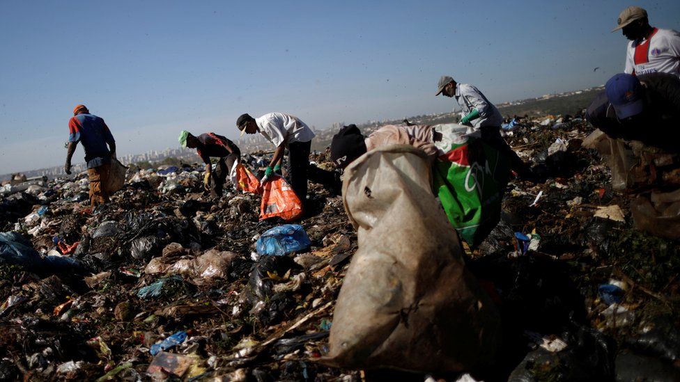 Waste pickers work at Lixao da Estrutural, Latin America's largest rubbish dump, in Brasilia, Brazil, 19 January 2018