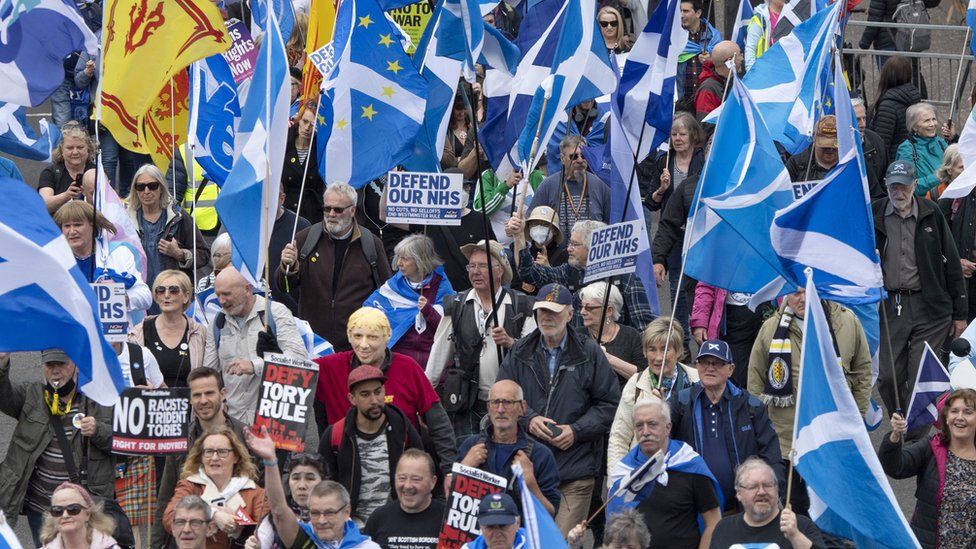 Scottish independence supporters march through Glasgow during an All Under One Banner march in May 2022