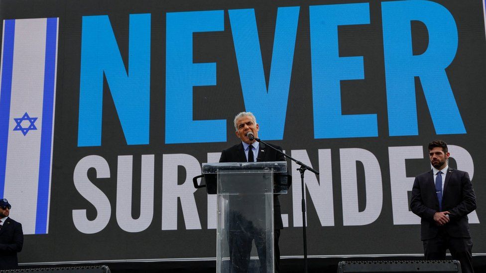 Israeli opposition leader Yair Lapid addresses a protest against the Israeli government’s planned judicial overhaul in Jerusalem (27 March 2023)
