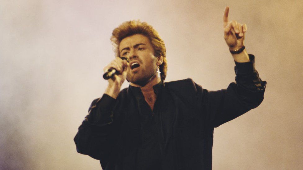 George Michael performs live on stage at an Aids awareness charity concert at Wembley Arena in London in April 1987