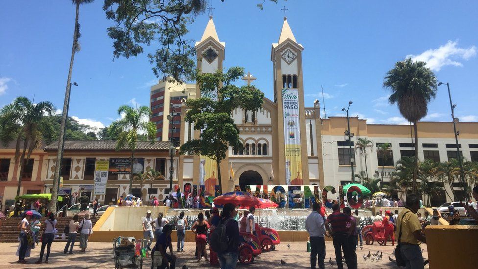 People walk on Villavicencio's square