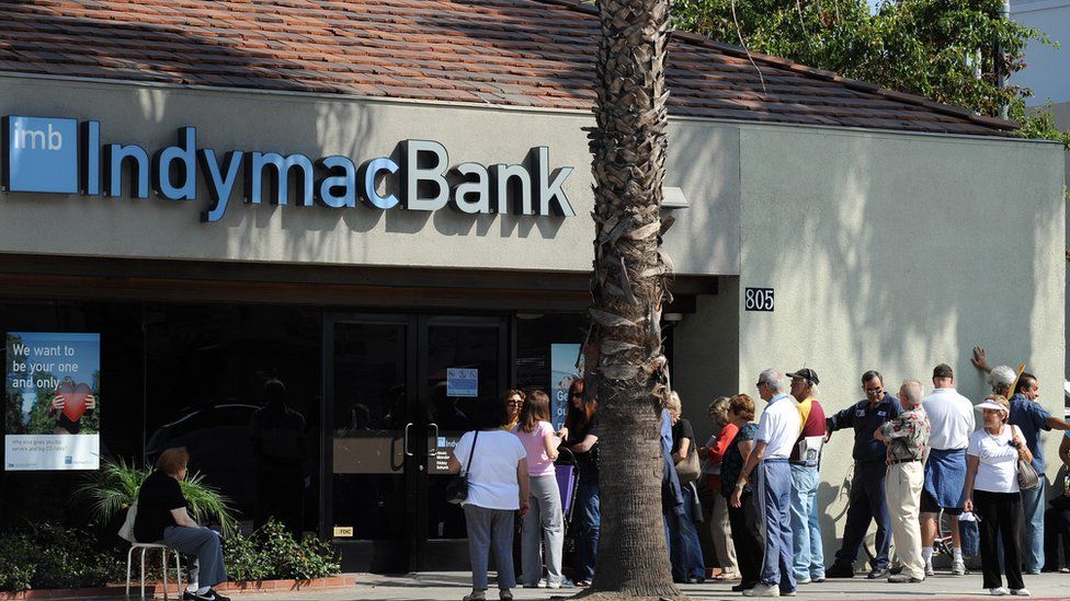 Customers line up in front of an IndyMac branch in July 2008