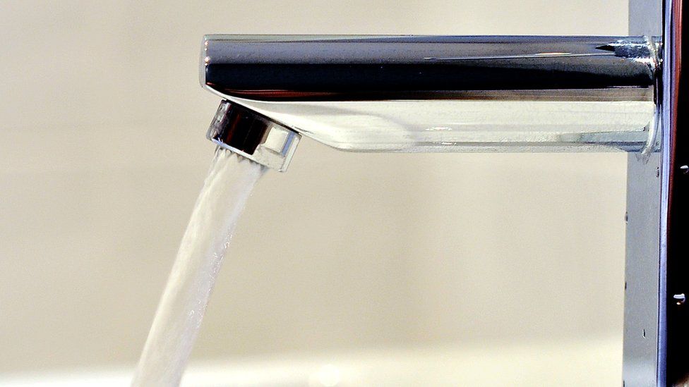 Water running from a domestic water tap