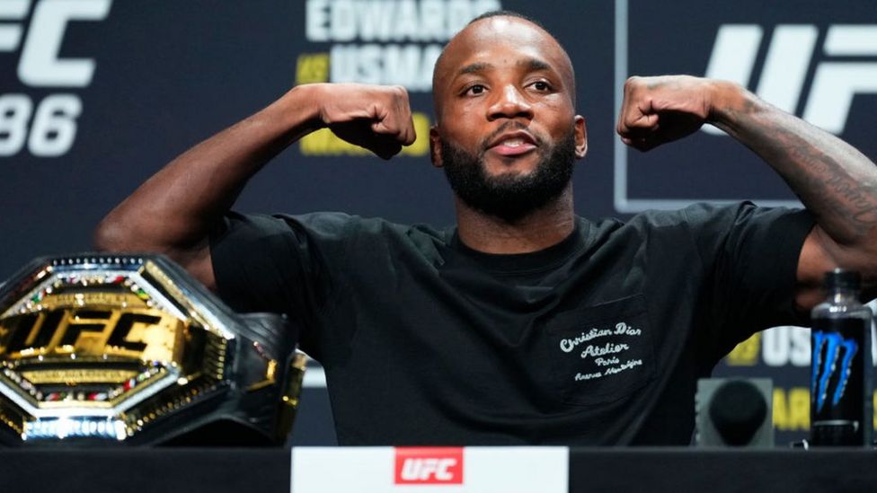 Leon Edwards: UFC champion up for WWE match after merger - BBC News