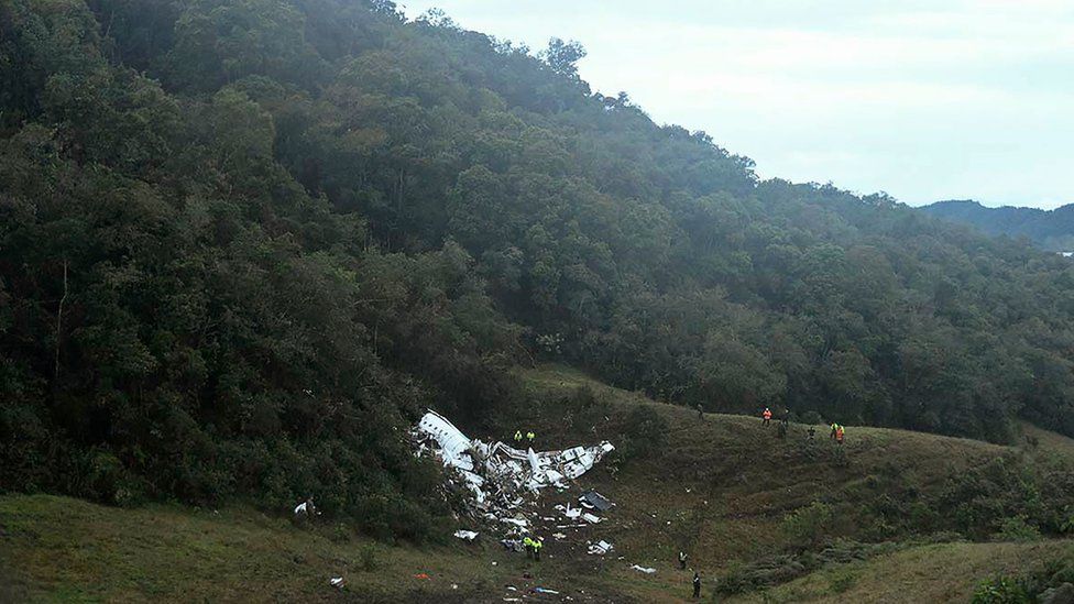 The wreckage of the Lamia airlines charter plane carrying members of the Chapecoense Real football team that crashed is seen in the mountains of Cerro Gordo, municipality of La Union, on 29 November