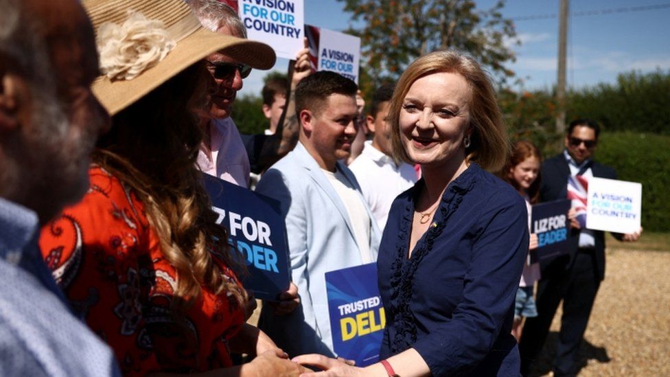 Liz Truss greets people at a leadership event