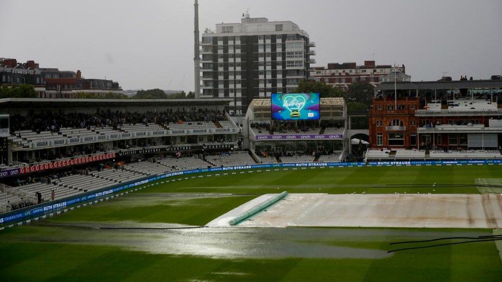 General view of water on the field as rain delays play between England and South Africa at Lord's Cricket Ground