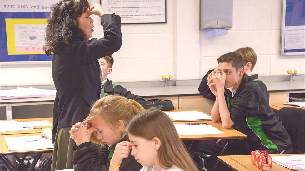 Pupils are shown how to do eye exercises