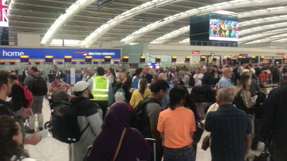 Holidaymakers face delays at Heathrow Airport
