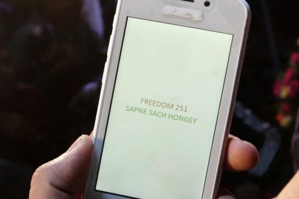 A closer view of the "Freedom 251" smartphone (R) as it is launched in New Delhi, India, 17 February 2016. Indian company Ringing Bells in a ceremony launched what could be the world's cheapest smartphone - with a price tag of less than 4 US dollars