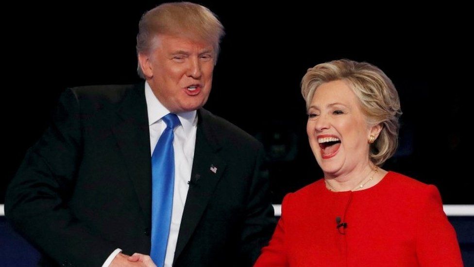 Trump and Clinton shake hands in 2016