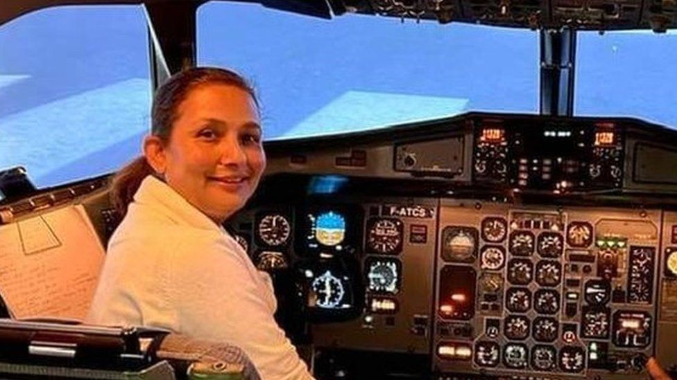 Anju in a cockpit