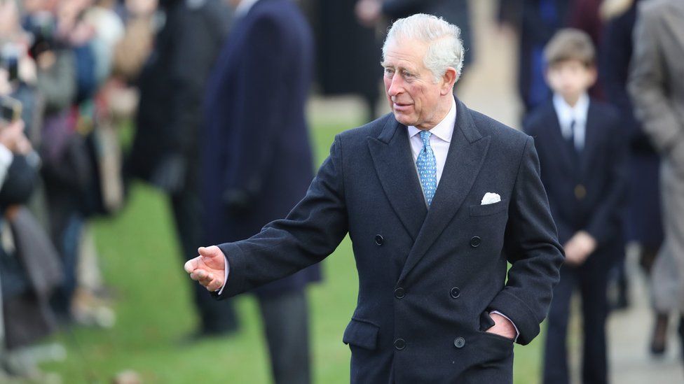 Prince Charles speaks to the crowds outside the church