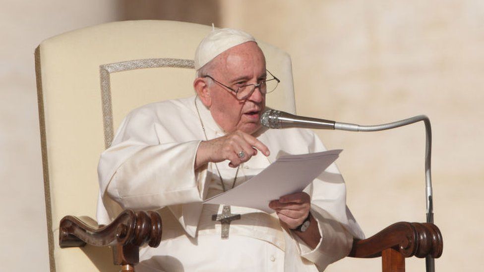 Pope Francis addressing an audience in Vatican city (stock photo)