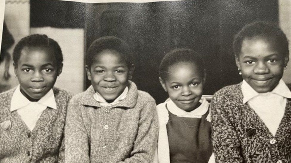 Glenn and three of his sisters