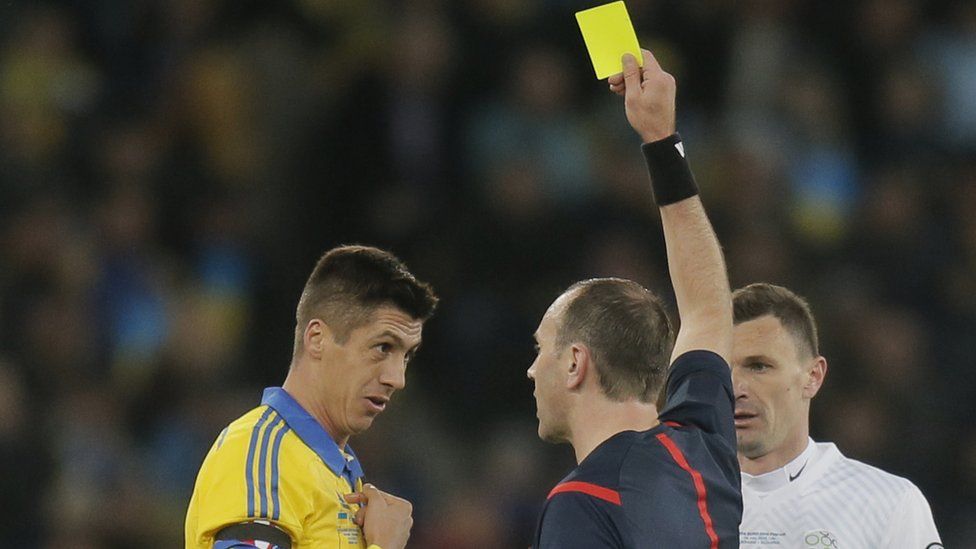 Ukrainian footballer getting a yellow card (file pic)