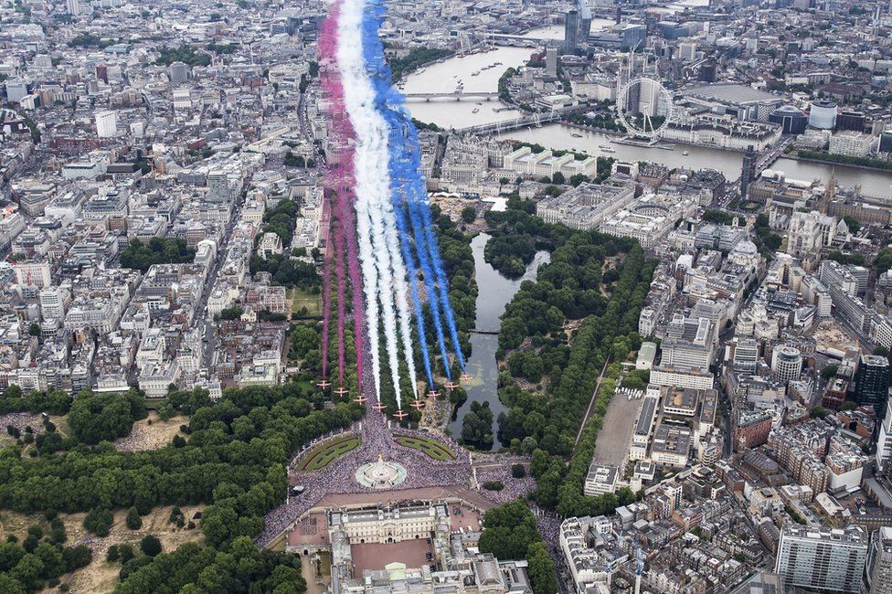 The Red Arrows perform for a flypast over London